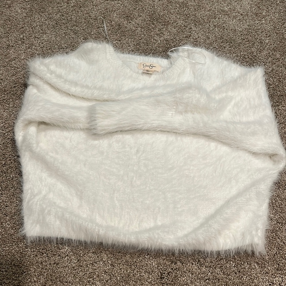 Fluffy white sweater